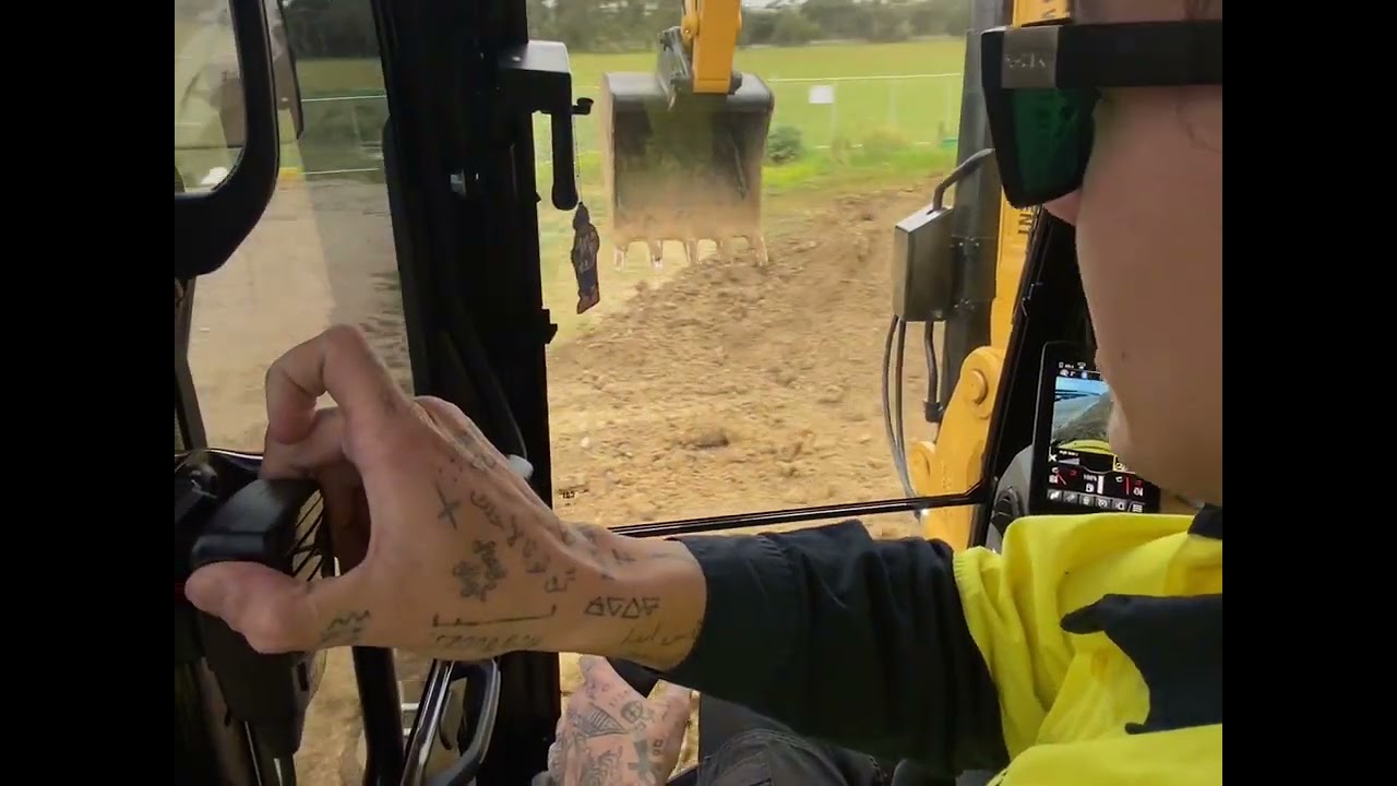 Caterpillar 308 Next Gen Excavator -loading trucks-