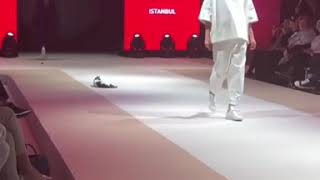Sweet cat invading the podium during the fashion show in Istanbul