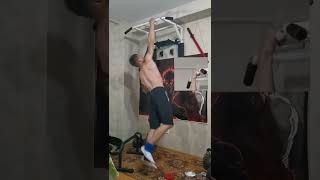 One arm pull up + 30 kg