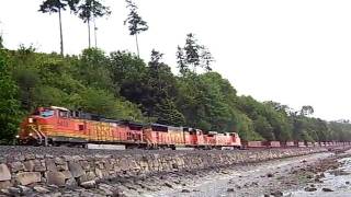 Mukilteo, WA  USA    low-tide beach, BNKF train honks at sister waving