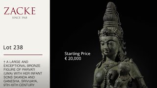 Lot 238 A Large Bronze Figure Of Parvati Uma With Her Infant Sons Skanda And Ganesha