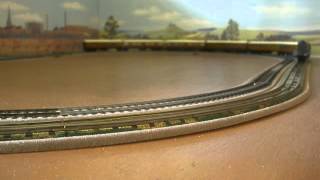 LNER A4 Wild Swan with 3 x twin articulated teak coaches