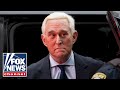 Roger Stone speaks to the media