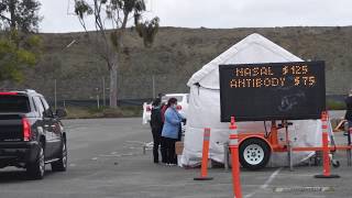 Healthcare workers do a nasal swab test at drive thru coronavirus
(covid-19) testing site the westminster mall in westminster, ca, on
monday, apr 6, 202...