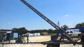 Flare stack being raised
