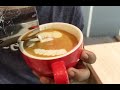 Pouring a latte art shiba inu pattern