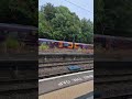 Ritchie catching a glimpse of a west midlands railway 196 at King's Norton