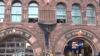 Residents pay respects to Boston firefighters