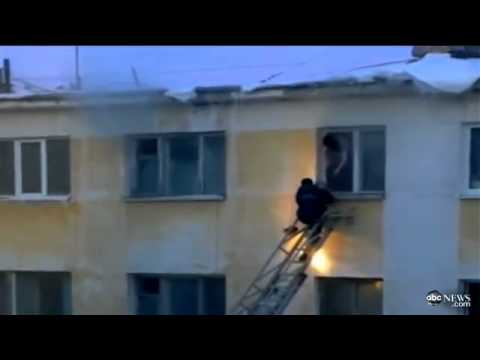 Russian Firefighter Knocked Down Rescue Ladder by Sno