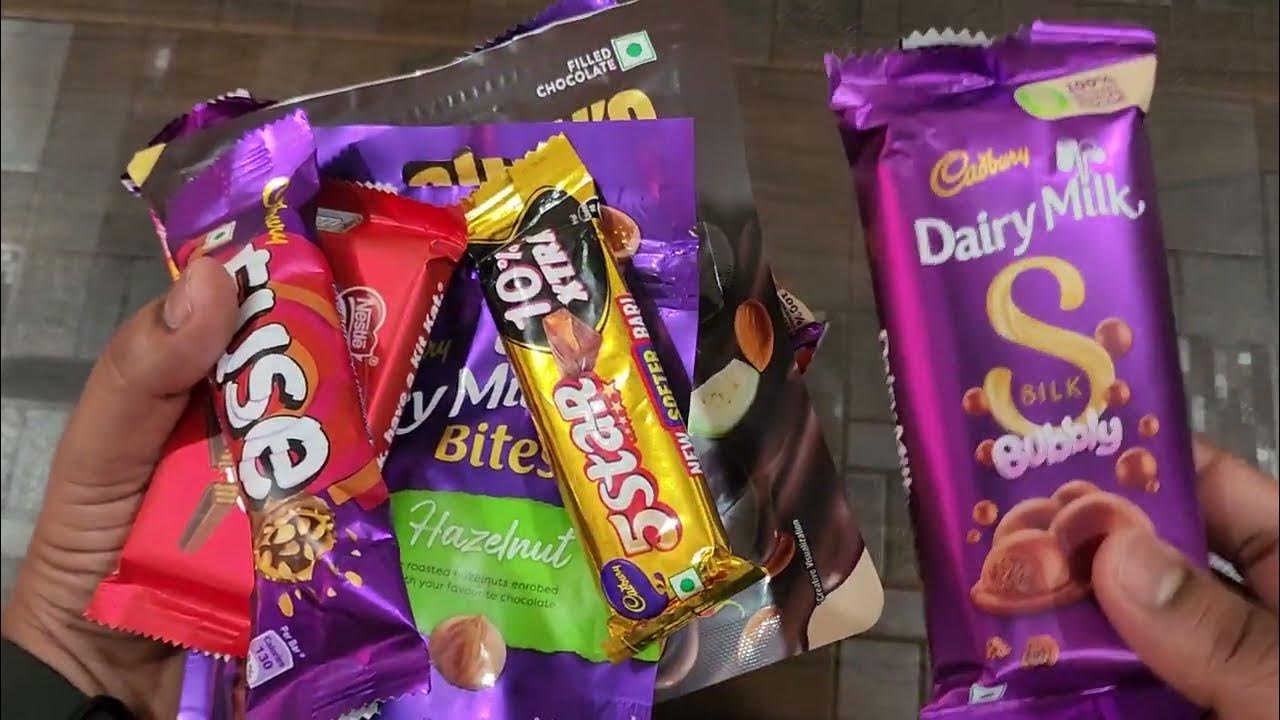 lots of candies, lots of chocolates, surprise toys, chocolate opening