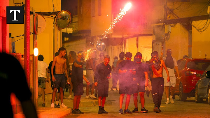 Anti-Migrant Groups Clash With Riot Police In Spain
