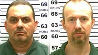 New York prison worker charged with helping fugitives
