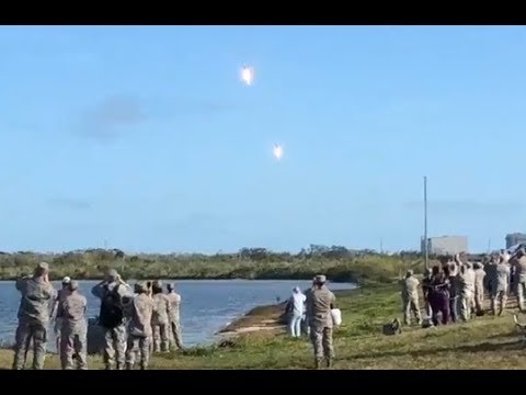 Crazy crowd reactions to twin Falcon Heavy booster landing.