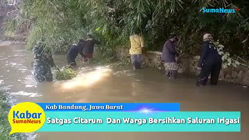 Anggota TNI Dari Satgas Citarum Ajak Warga Bersihkan Saluran Irigasi Desa Purungserab Soreang
