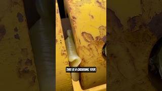 What is this tool for? Greasing drive shaft dump truck caterpillar #heavyequipment #mechanic