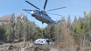Gigantic US CH53 Lifts Damaged Helicopter from Mountain Site