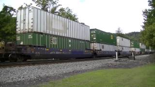Two Fast NS Trains pass each other in one shot-one lead by a UP Loco!