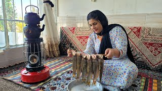 Cooking river salmon on a rainy day in Iranian village style