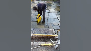 Pouring Flowpoint Smooth Grout Into Paving Joints