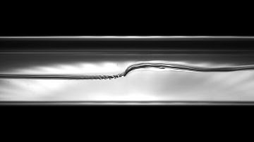 Horizontal Two-Phase R-123 Plug Flow: V006L075.mpg