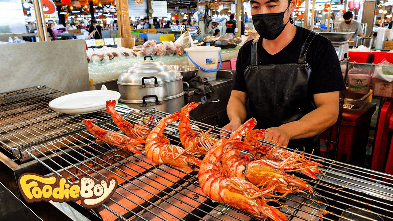Eating At A Seafood Market In Bangkok Thailand Salmon Prawns Eating At A Seafood Market In Bangkok Thailand Salmon Prawns