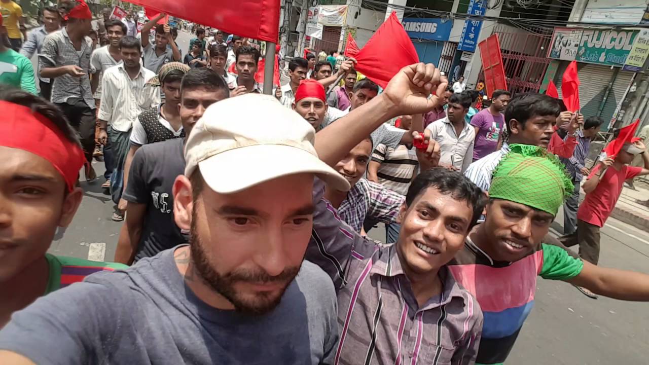 Tourist in Dhaka Bangladesh street demonstration Labour Day