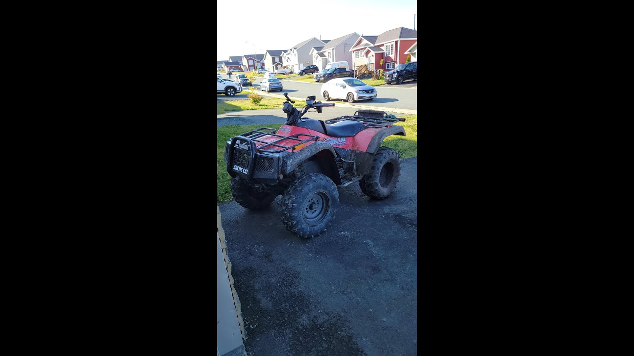 Ripping the four wheeler through the trails