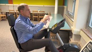 Superintendent Engstrom tries out Robbinsdale Middle School's Read & Ride in the RMS Library! Guide