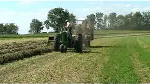 Baling hay with a John Deere 630 tractor and 336 baler.