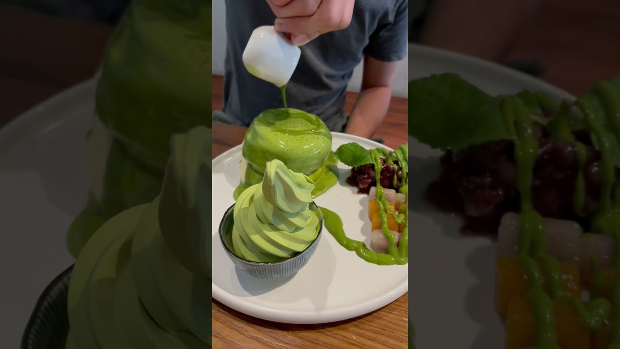 Japanese Matcha soufflé pancake with azuki bean and ice cream. 