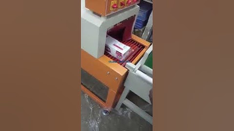 L SHRINK PACKING MACHINE WITH CONVEYOR SYSTEM