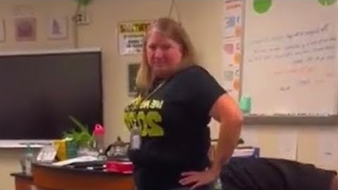 A teacher throws a student phone, and other students are outraged.