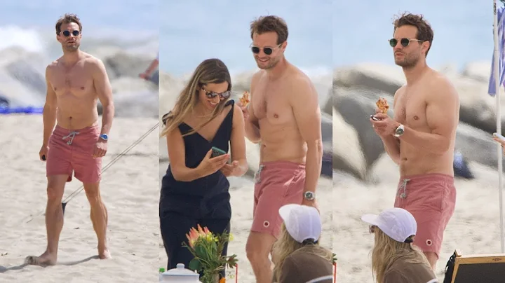 NEW!! JAMIE DORNAN on the beach with his wife Amel...