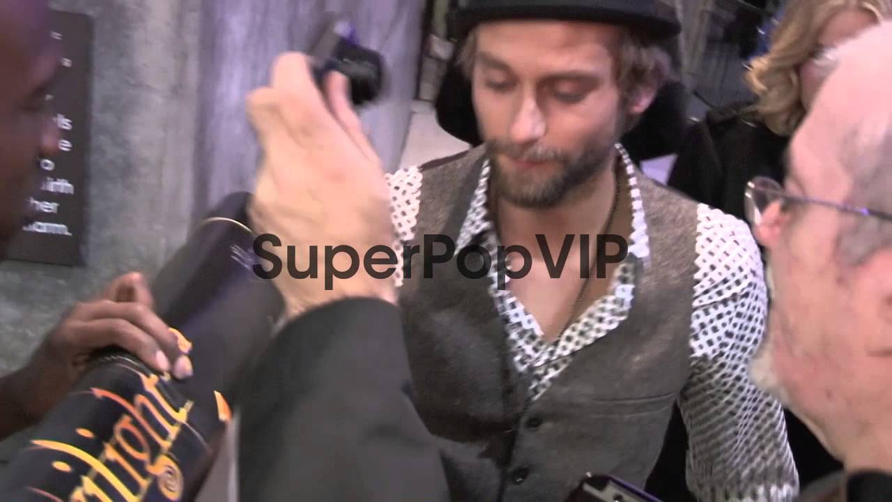 Joe Anderson greets a fan while departing the Twilight Br...