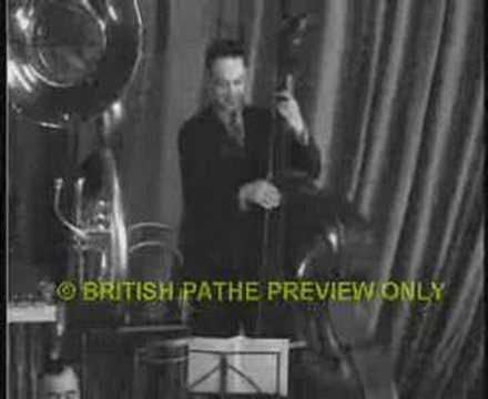 Jack Hylton and his band play a mournful song in rehearsal