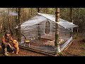 Building a woodland cabin with plastic wrap  wood stove  survival project  bushcraft shelter