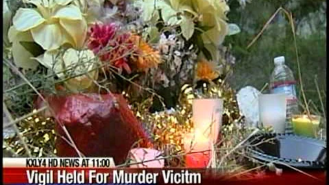 Candlelight vigil honors murder victim