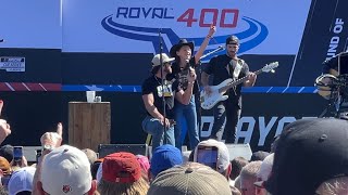 Riley Green Brings Girl On Stage To Sing “Different Round Here” Live At Charlotte Motor Speedway