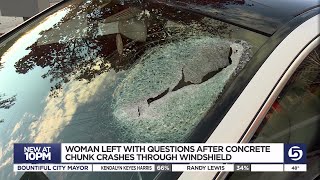 Woman left with unsettling questions after concrete chunk crashes through windshield