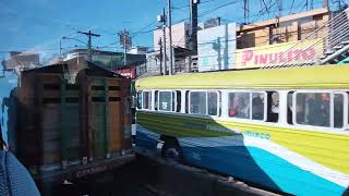 Guatemala City November 2023. Driving. Colorful Busses. Colorful Clothes.