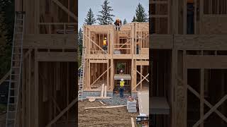construction workers building a nice modern house