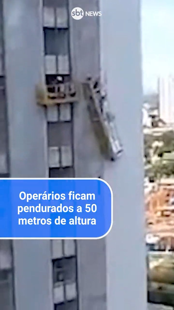 Operários ficam pendurados a 50 metros de altura após andaime cair