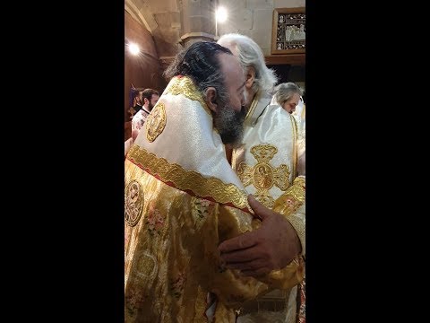 Archbishop Makarios exchanging