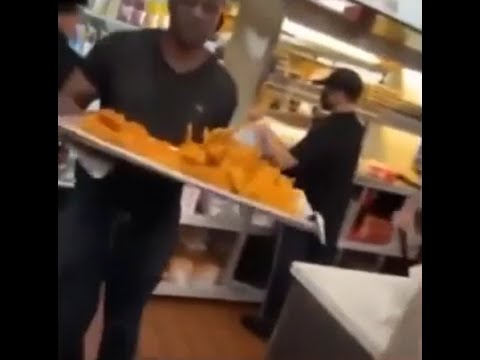Man steals a tray of fried chicken from restaurant