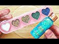 Slime Coloring with Glitter Makeup! Mixing Heart Eyeshadow &amp; Shimmer Body Gel into Clear Slime!