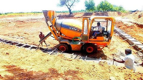 Ajax Flori Self Loading Concrete Machine AJAX ARGO 2000 Pond wall Concrete Work on Field