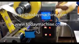 Candy flow wrapper with easy operation