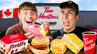 Brits try Tim Horton's Breakfast for the first time!!