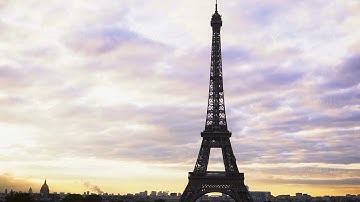Eiffel Tower with cloudscape background.