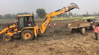 Jcb 3Dx Loading mud in Eicher 551 Working with JCB 3DX Eco for lake making